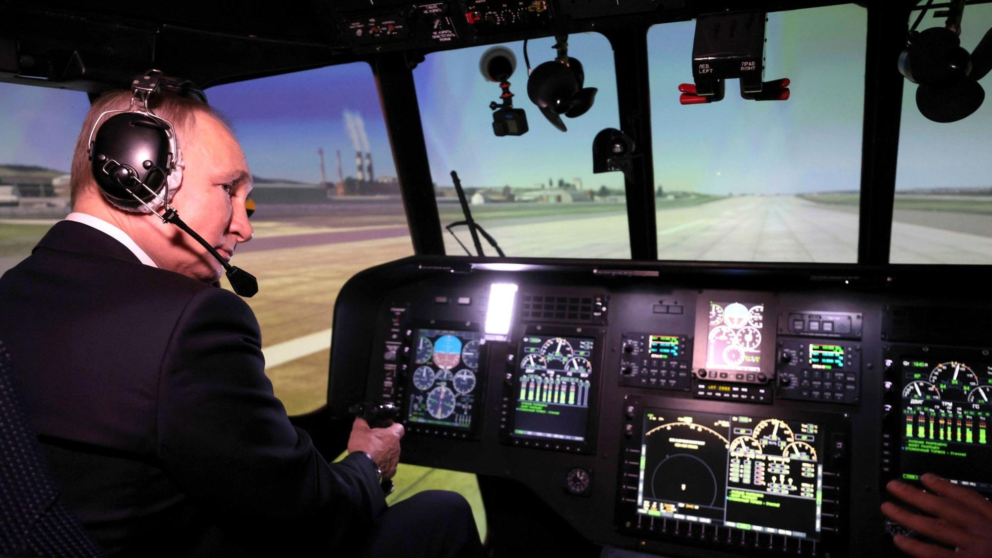 March 14, 2023, Ulan-Ude, Buryatia, Russia: Russian President Vladimir Putin flies a Mi-171A2 helicopter simulator at the training centre for the Ulan-Ude Aviation Plant, March 14, 2023 in Ulan-Ude, Buryatia, Russia. Ulan-Ude Russia - ZUMAp138 20230314_zaa_p138_016 Copyright: xMikhailxMetzel/KremlinxPoolx