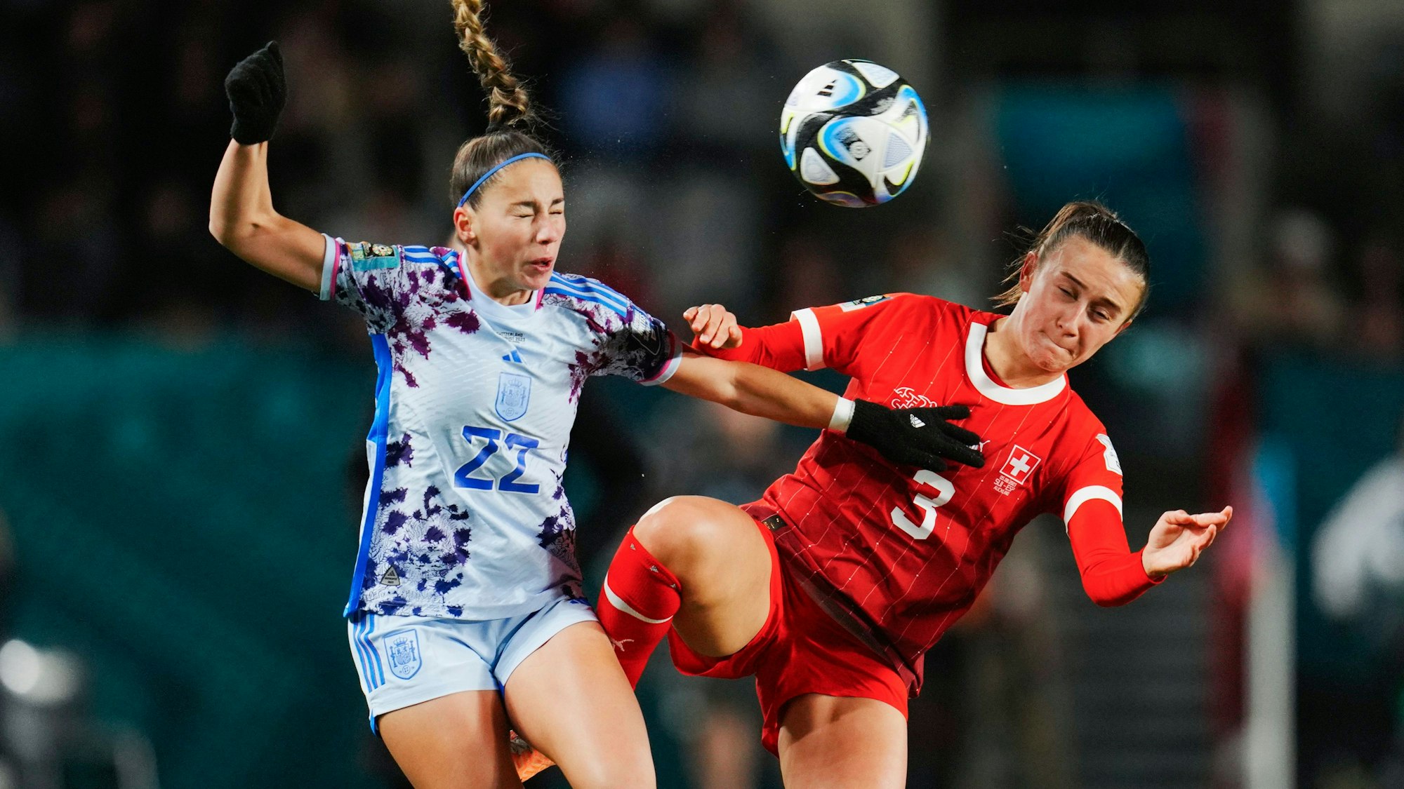 Switzerland's Lara Marti, right, and Spain's Athenea Del Castillo compete for the ball during the Women's World Cup second round soccer match between Switzerland and Spain at Eden Park in Auckland, New Zealand, Saturday, Aug. 5, 2023. (AP Photo/Abbie Parr)