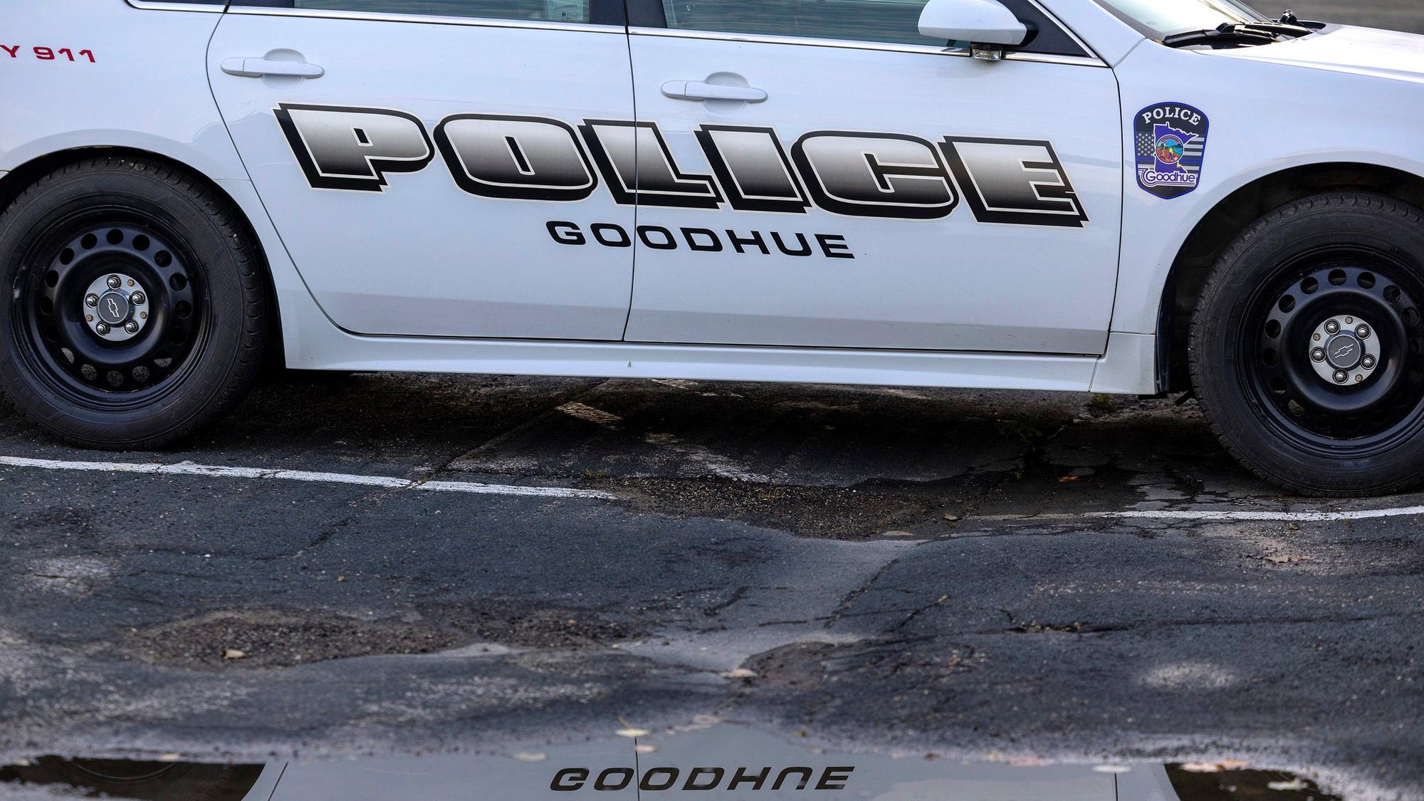 A Goodhue police car is parked outside City Hall on Monday, Aug. 14, 2023, in Goodhue, Minn. The small town will soon be without a police department, an exodus spurred by low pay for the chief and his officers. (Carlos Gonzalez/Star Tribune via AP)