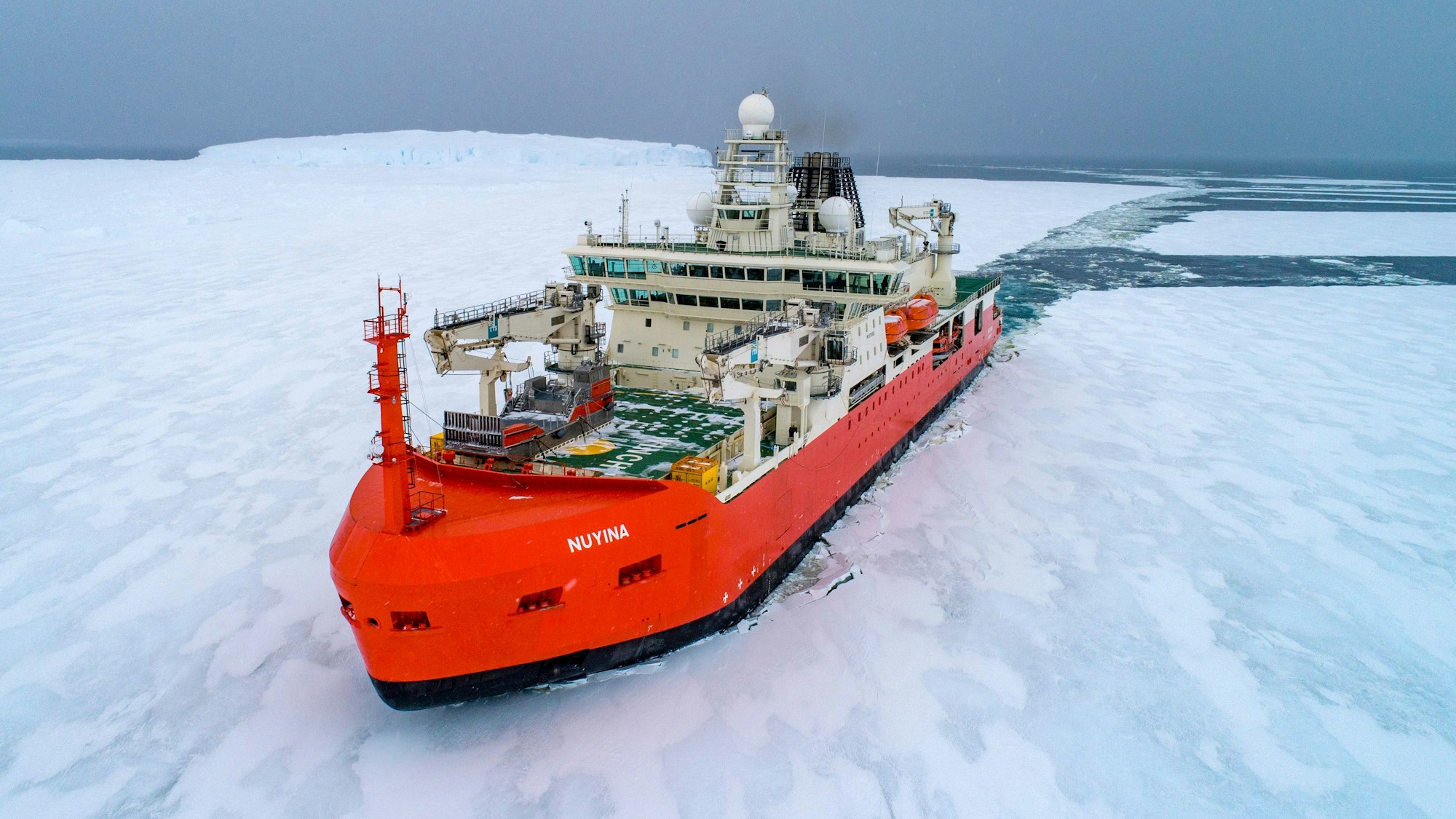 In this undated photo provided by the Australian Antarctic Division, the icebreaker RSV Nuyina is photographed from the air. An Australian who fell ill at the remote Casey research station is returning home on the RSV Nuyina following a mission to rescue him, authorities said Tuesday, Sept. 5, 2023. (Australian Antarctic Division via AP)