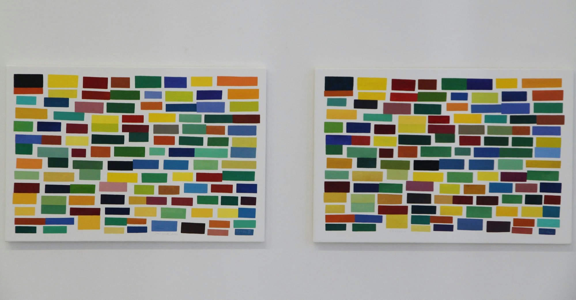 Ausstellung Ines Hock im Stadtmuseum, zwei Bilder mit vielen Vierecken in verschiedenen Farben