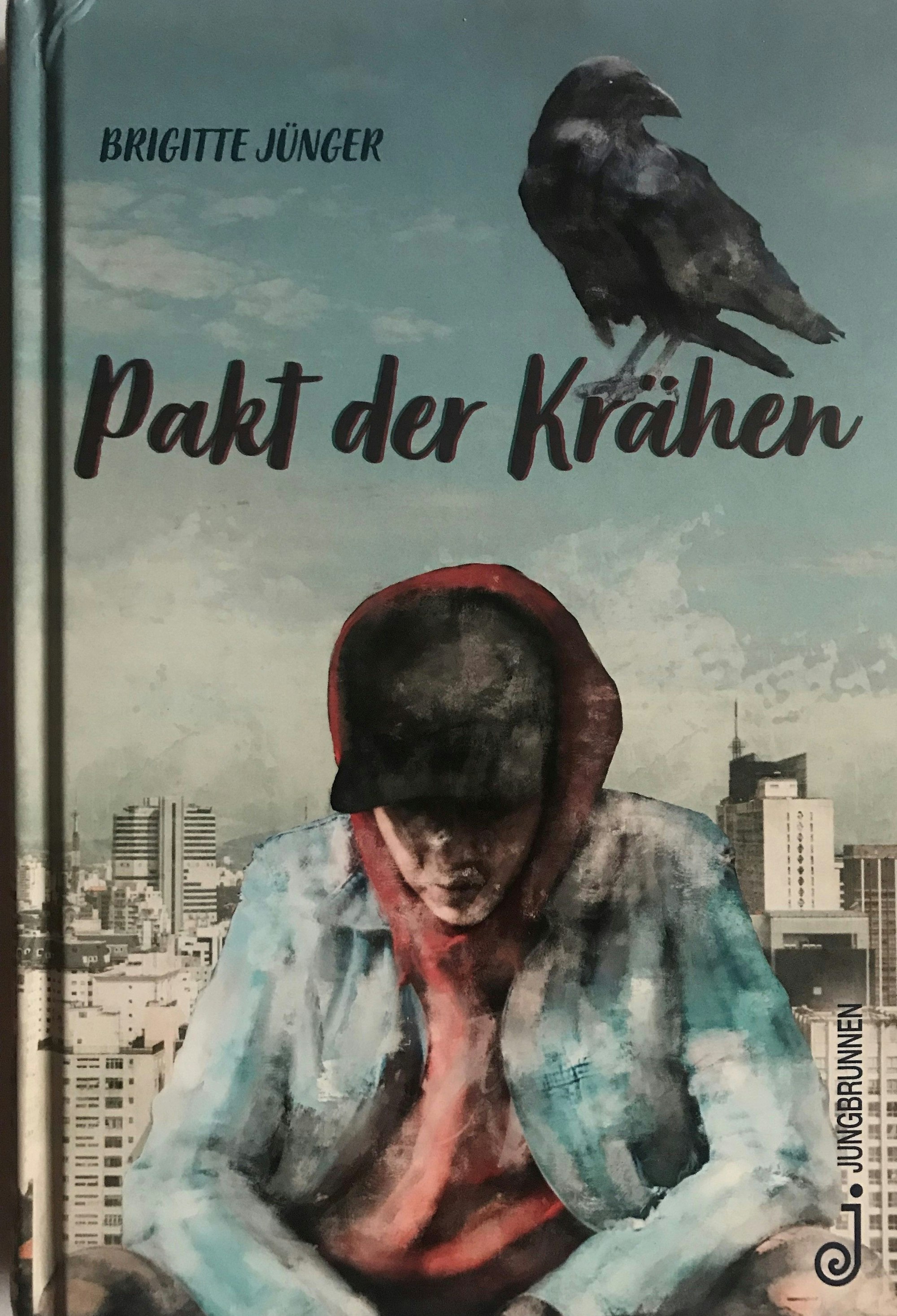 Das Buchcover von „Pakt der Krähen“ der Kölner Autorin Brigitte Jünger.