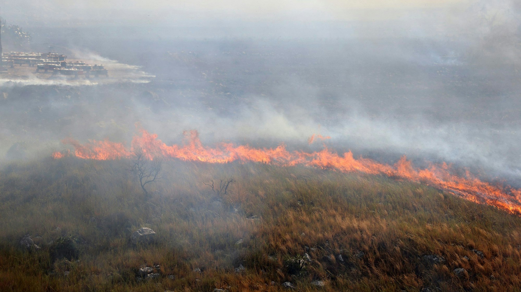 A wildfire is seen near Palermo, Sicily, Italy, between Montelepre and Villabate, Friday, Sept. 22, 2023. (Alberto Lo Bianco/LaPresse via AP)