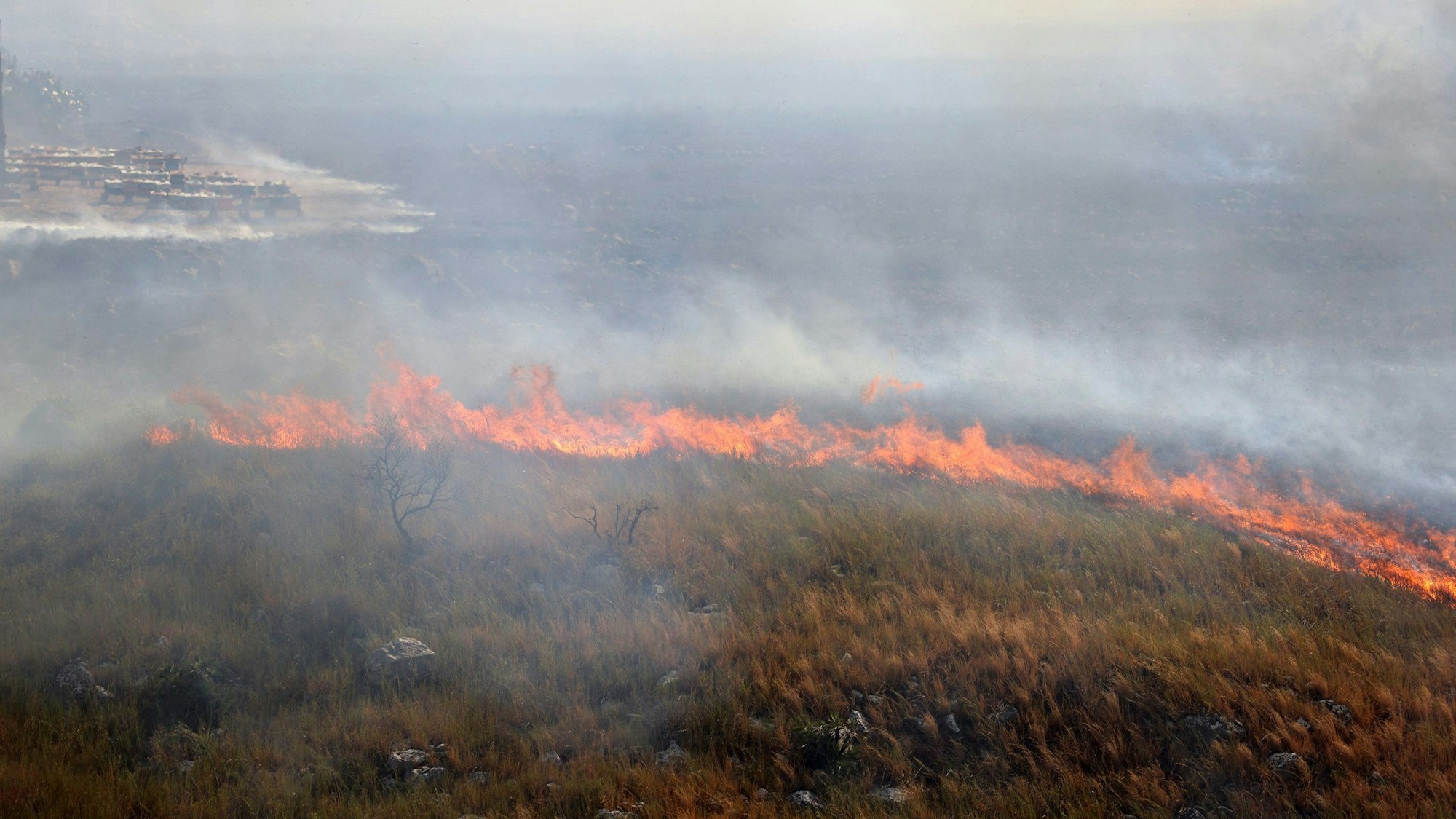 A wildfire is seen near Palermo, Sicily, Italy, between Montelepre and Villabate, Friday, Sept. 22, 2023. (Alberto Lo Bianco/LaPresse via AP)