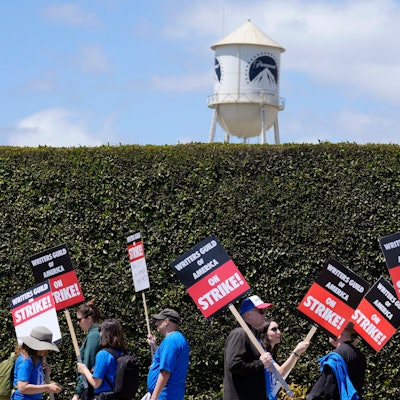 FILE - Striking writers take part in a rally in front of Paramount Pictures studio, Tuesday, May 2, 2023, in Los Angeles. A tentative deal was reached, Sunday, Sept. 24, 2023, to end Hollywood’s writers strike after nearly five months. (AP Photo/Chris Pizzello, File)