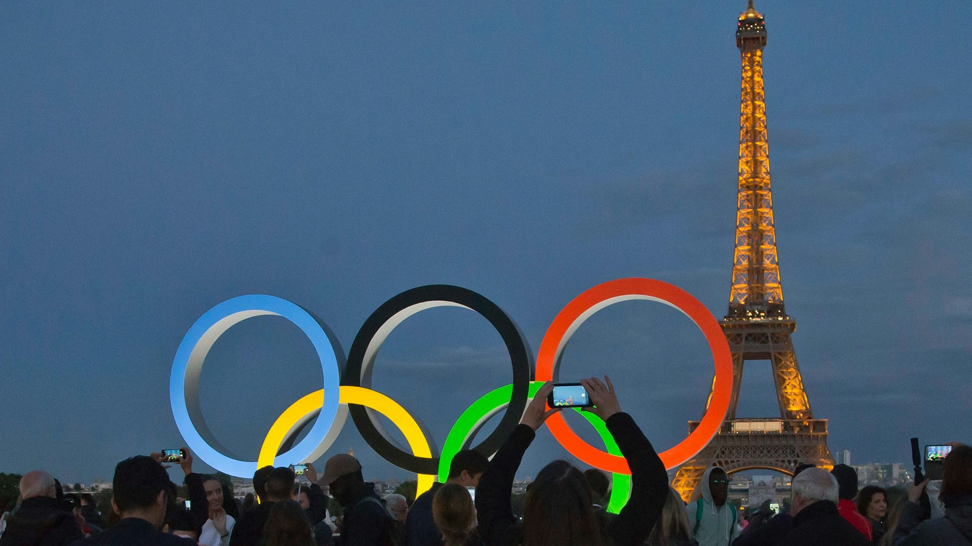 FILE - The Olympic rings are set up on Trocadero plaza that overlooks the Eiffel Tower in Paris, France, Thursday, Sept. 14, 2017. Votes are taking place Friday, Sept 29, 2023, on whether to “partially suspend” Russia from the International Paralympic Committee. That could mean Russia sends competitors to the Paralympics in Paris next year but that they have to compete as neutral athletes without national symbols. (AP Photo/Michel Euler, File)