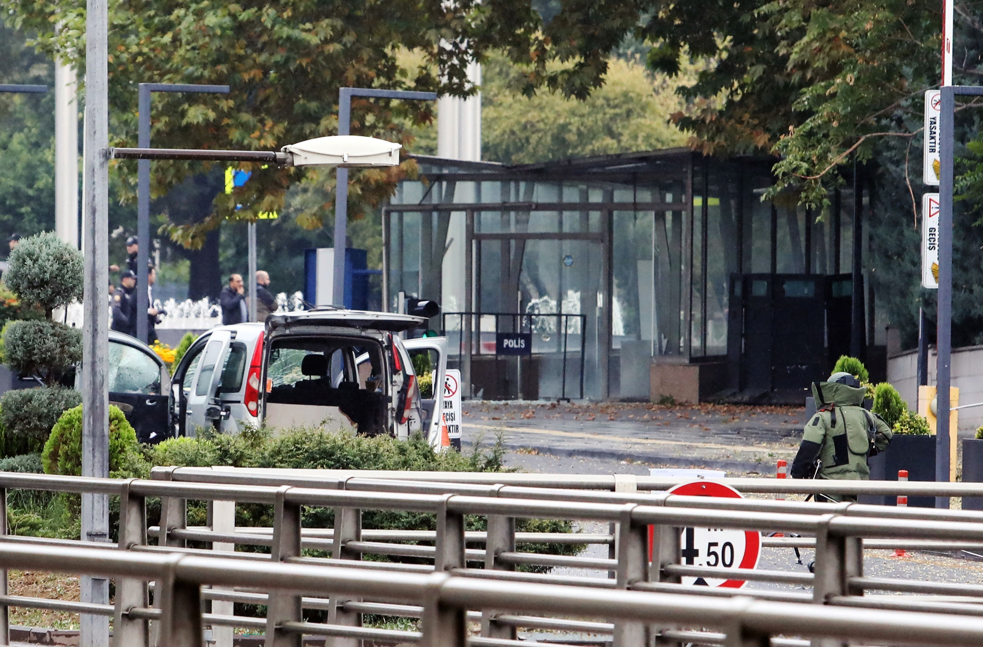This photograph shows the commercial vehicle used by the two attackers near the Interior Ministry in Ankara, on October 1, 2023, following a bomb attack leaving two police officers injured. The interior ministry said on October 1, 2023, that two attackers arrived in a commercial vehicle around 9:30 am (0630 GMT) "in front of the entrance gate of the General Directorate of Security of our Ministry of the Interior, and carried out a bomb attack." (Photo by Adem ALTAN / AFP)