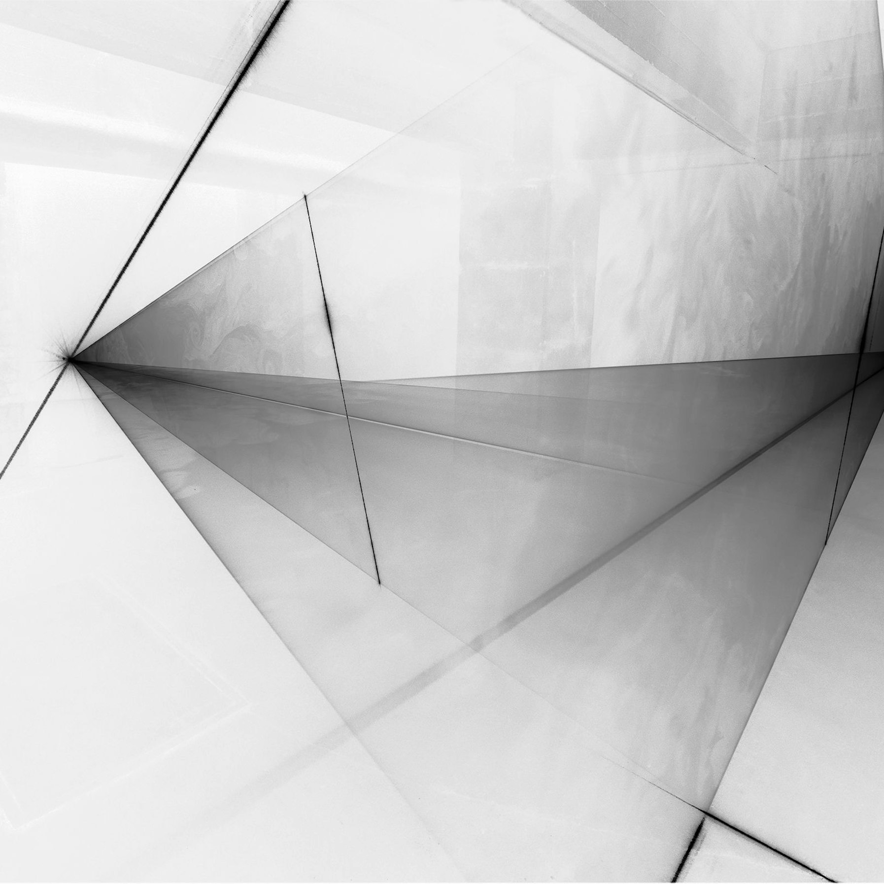 Ein grauer Raum mit schwarzen Vertikalen und grauen Flächen.