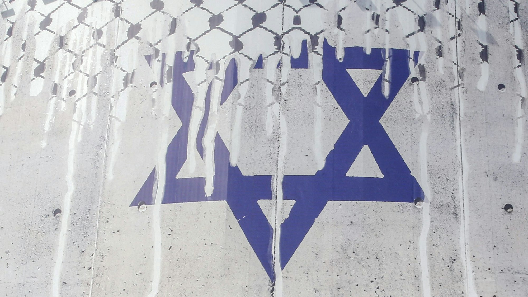 A man rides his motorcycle past an anti-Israel billboard with the chequerred keffiye covering the Star of David, entitled "Operation Al-Aqsa Flood," in solidarity with the Palestinians in Tehran's central Vali-Asr square on October 8, 2023. The Israeli-Palestinian conflict's bloodiest escalation in decades saw Hamas carry out a massive rocket barrage and ground, air and sea operation on October 7 that Israel's army said had killed more than 200 Israelis and wounded 1,000, while soldiers and civilians were taken hostage. (Photo by AFP)