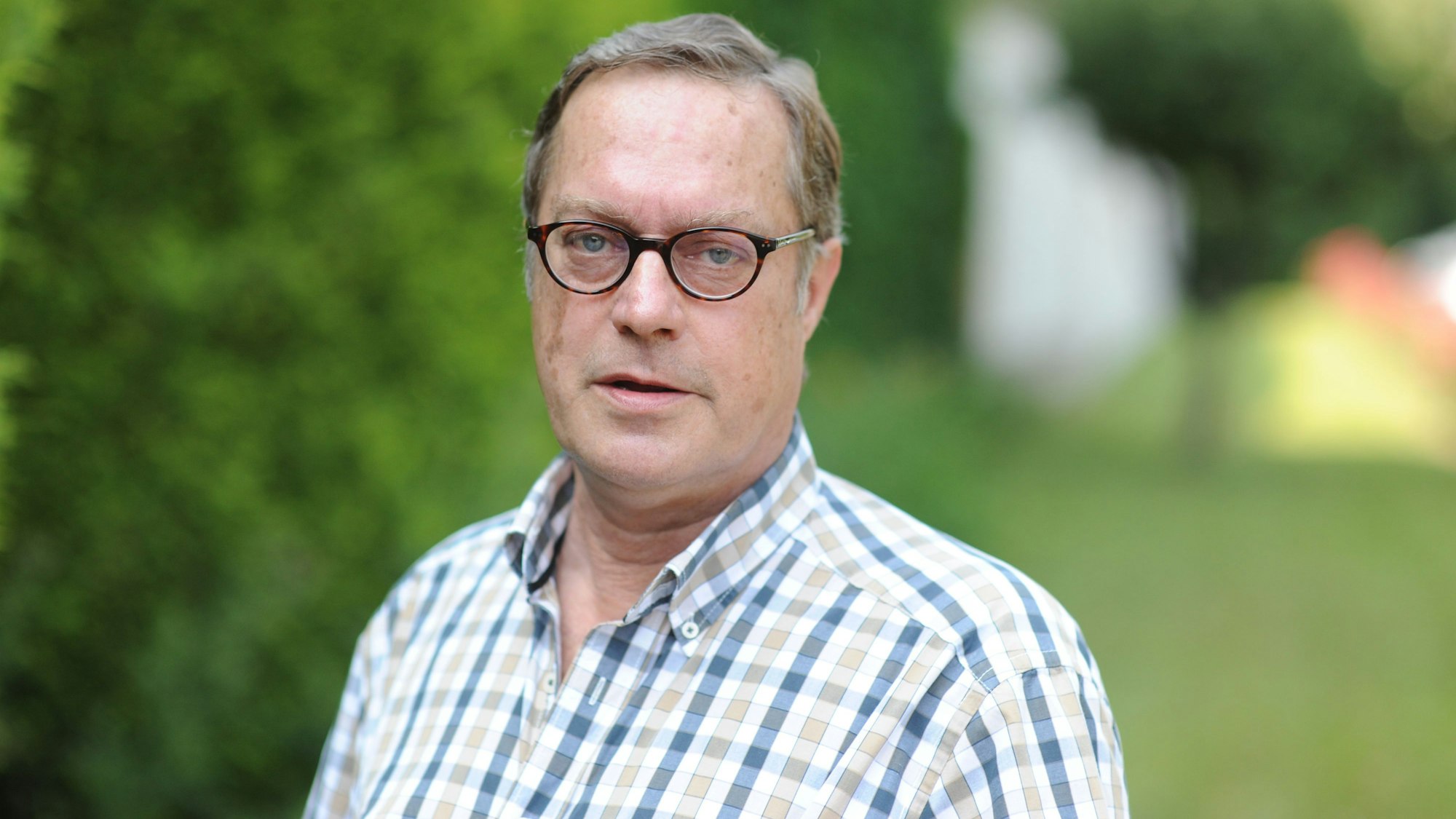 Ein Porträtbild des Journalisten.