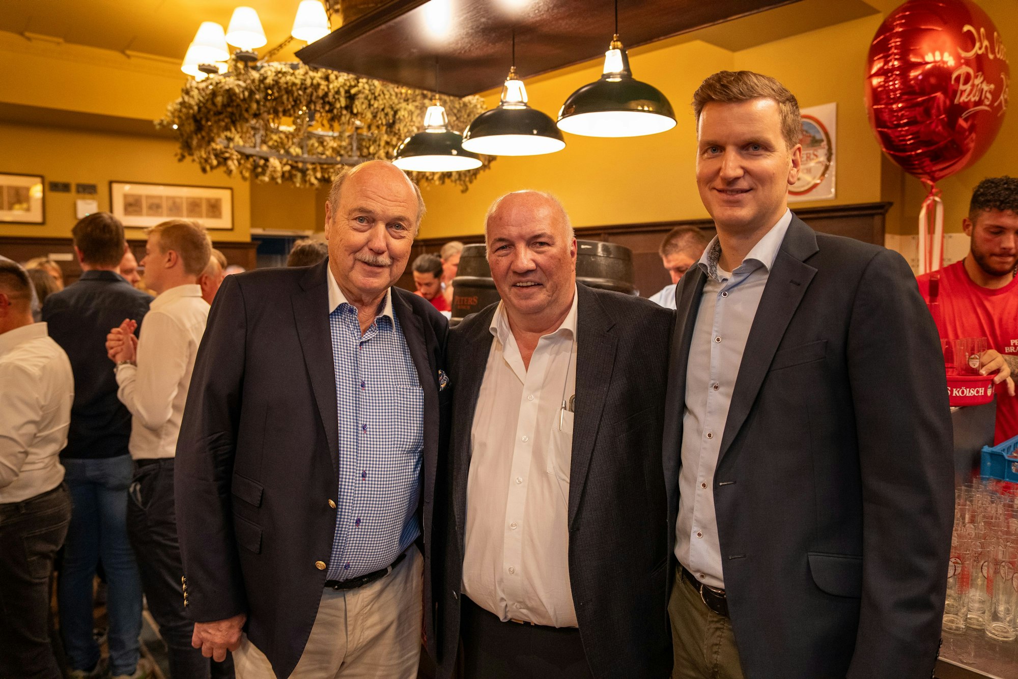 Hans Peters, Uwe Esser und Felix Peters bei der feierlichen Eröffnung des „Peters am Hahnentor“.