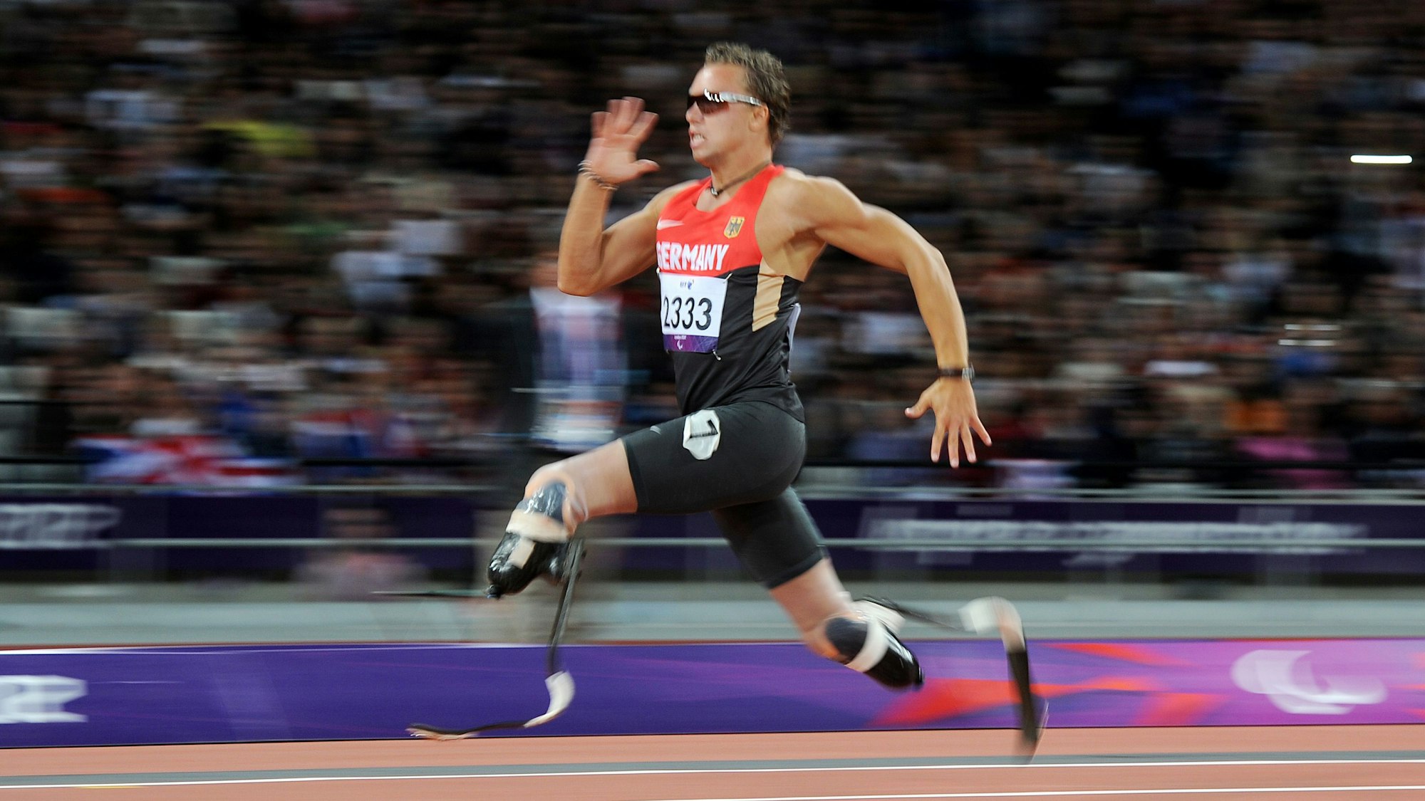 David Behre of Germany competes during the men's 200m - T44 round 1 at the Olympic Stadium during the London 2012 Paralympic Games.