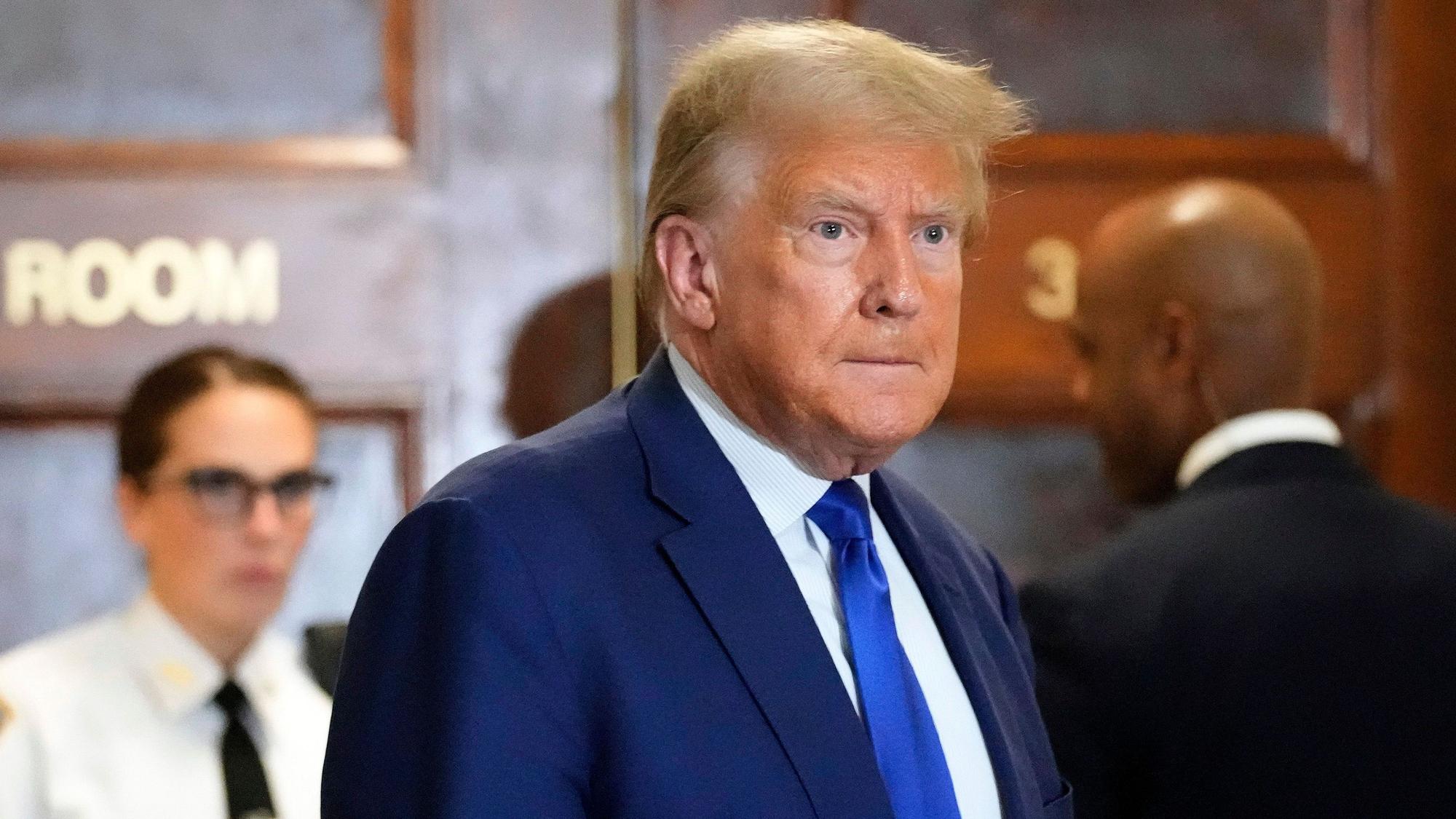 FILE - Former President Donald Trump speaks during a break in his civil business fraud trial at New York Supreme Court, Oct. 25, 2023, in New York. The Donald Trump who testifies at a New York civil trial on Monday may be more subdued than the version often seen in campaign rallies.