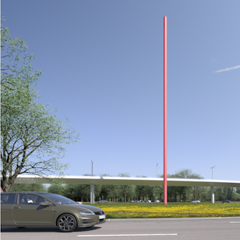 Ein Brücke verläuft über den Verteilerkreis Süd um das Kunstwerk „Standortmitte“ herum.