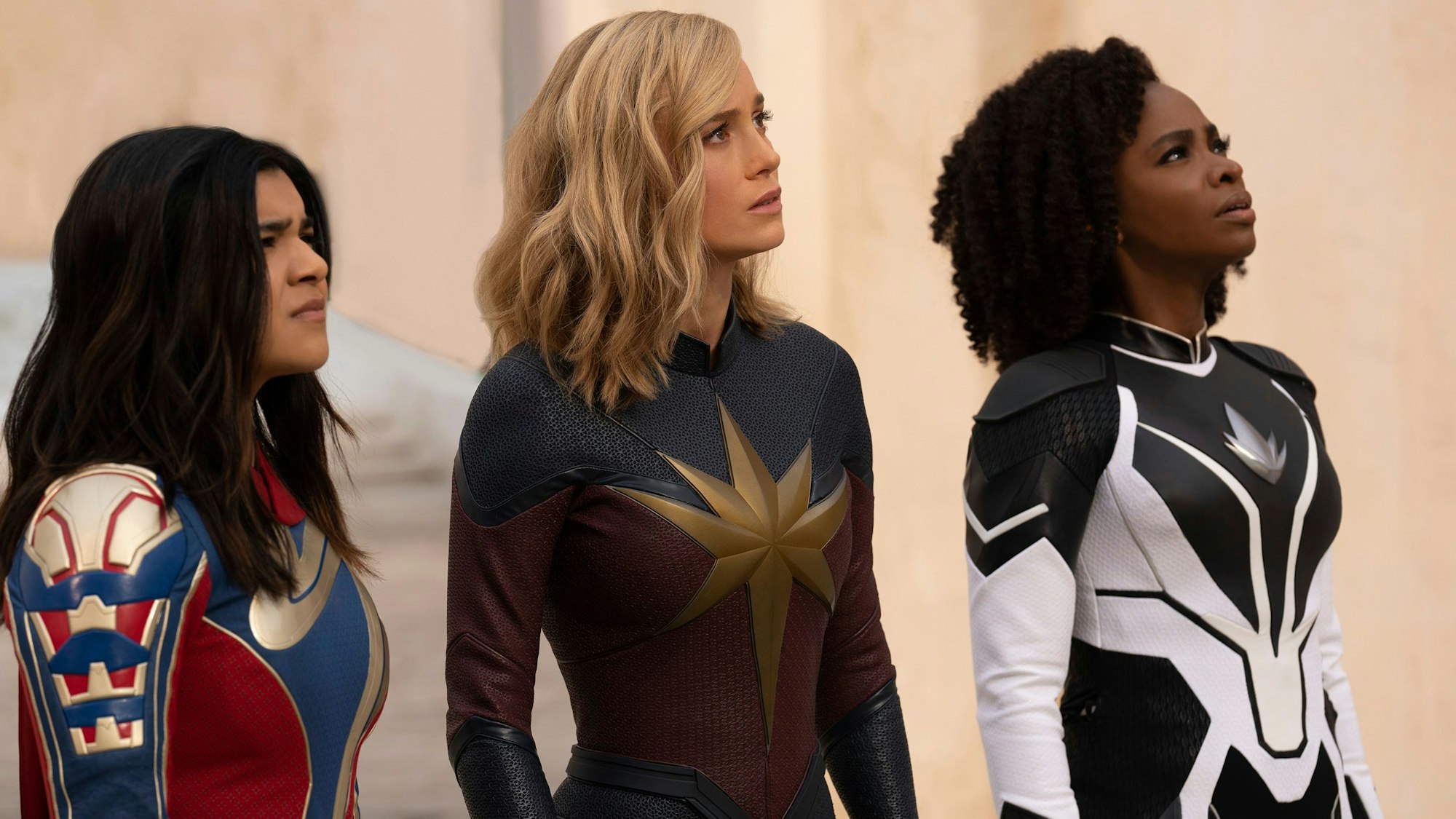This image released by Disney shows, from left, Iman Vellani as Ms. Marvel, Brie Larson as Captain Marvel, and Teyonah Parris as Captain Monica Rambeau in a scene from "The Marvels." (Laura Radford/Disney-Marvel Studios via AP)