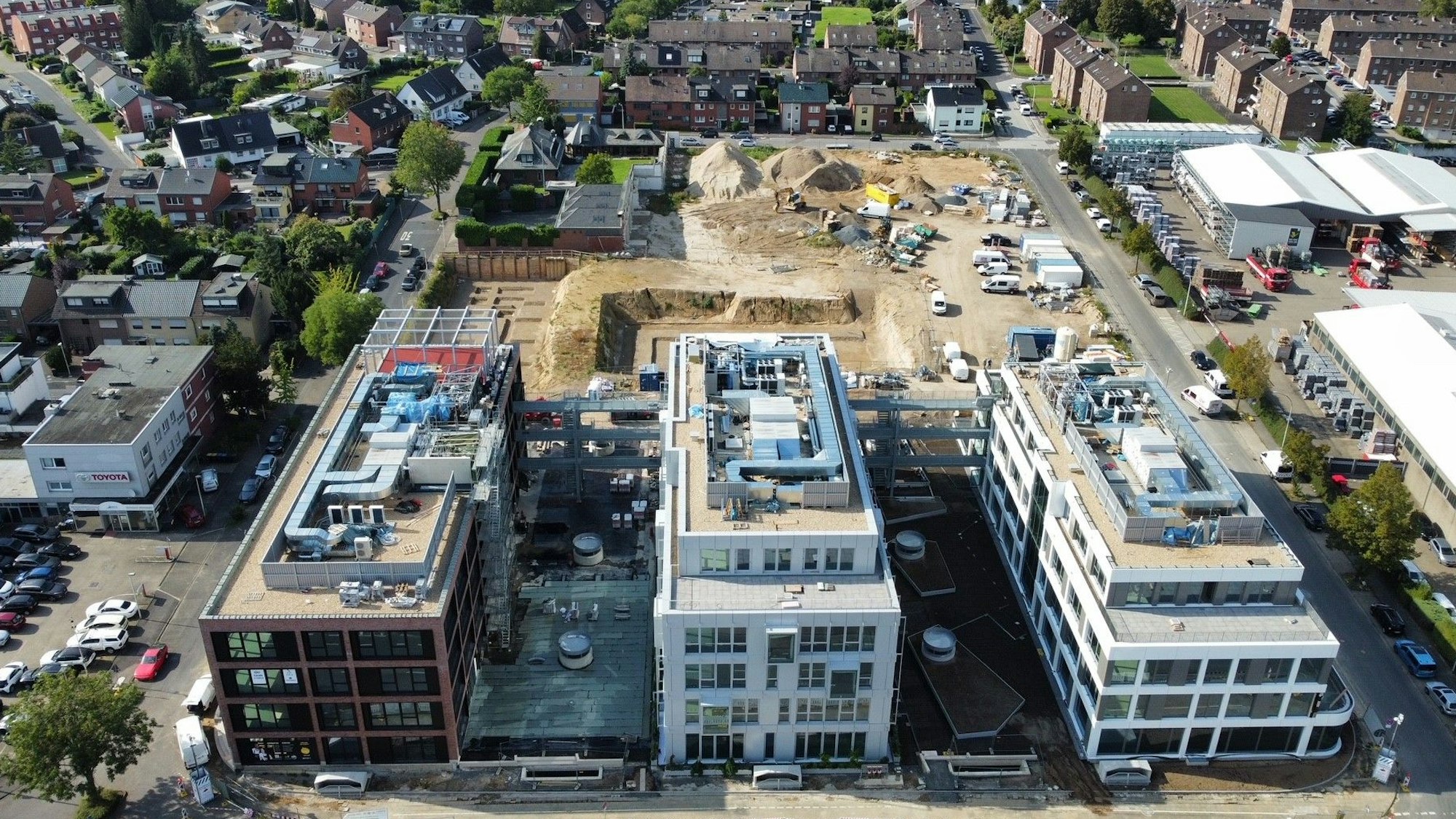 Auf dem Bild ist eine Luftaufnahme des Neobel-Quartiers zu sehen.