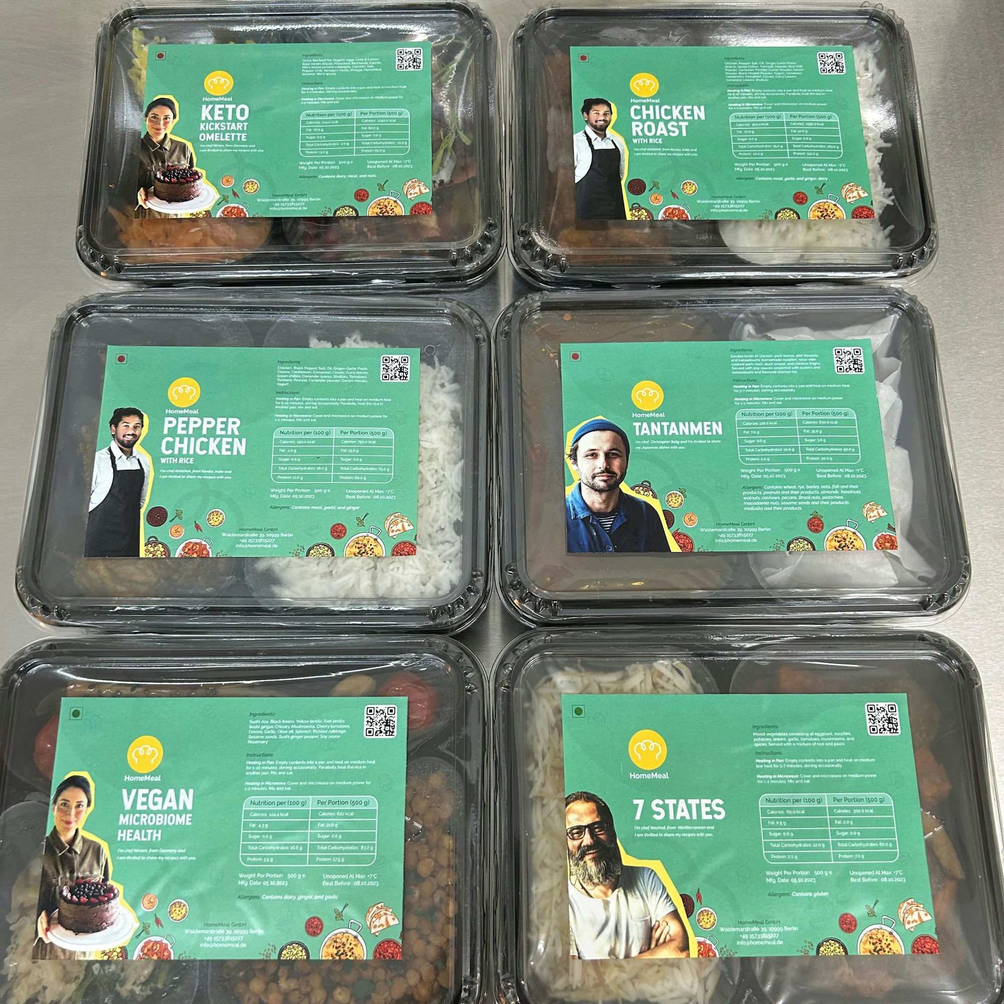 Verschweißtes Essen mit Etiketten, auf denen die Köche zu sehen sind