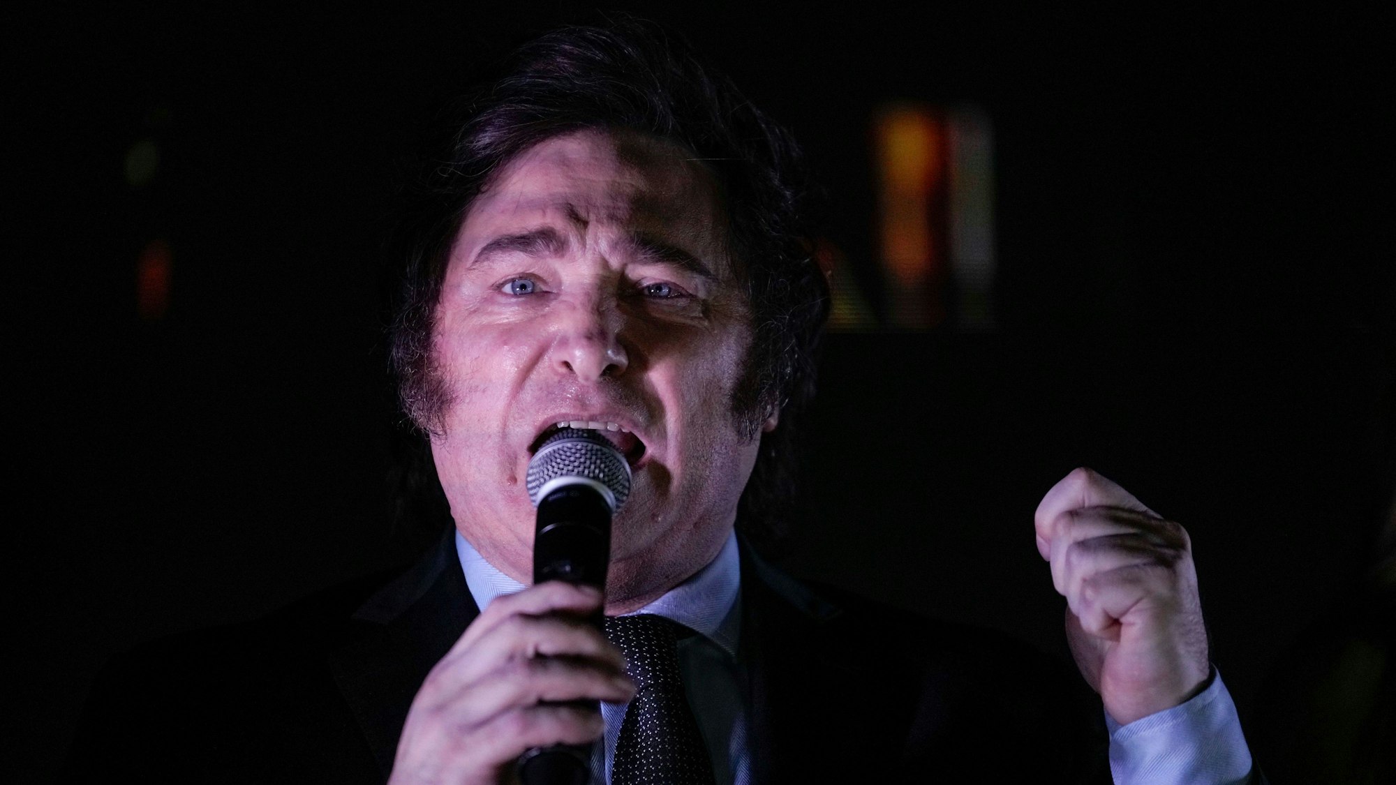 Candidate of the Liberty Advances coalition Javier Milei speaks to supporters outside his campaign headquarters after winning the presidential runoff election in Buenos Aires, Argentina, Sunday, Nov. 19, 2023. (AP Photo/Rodrigo Abd)