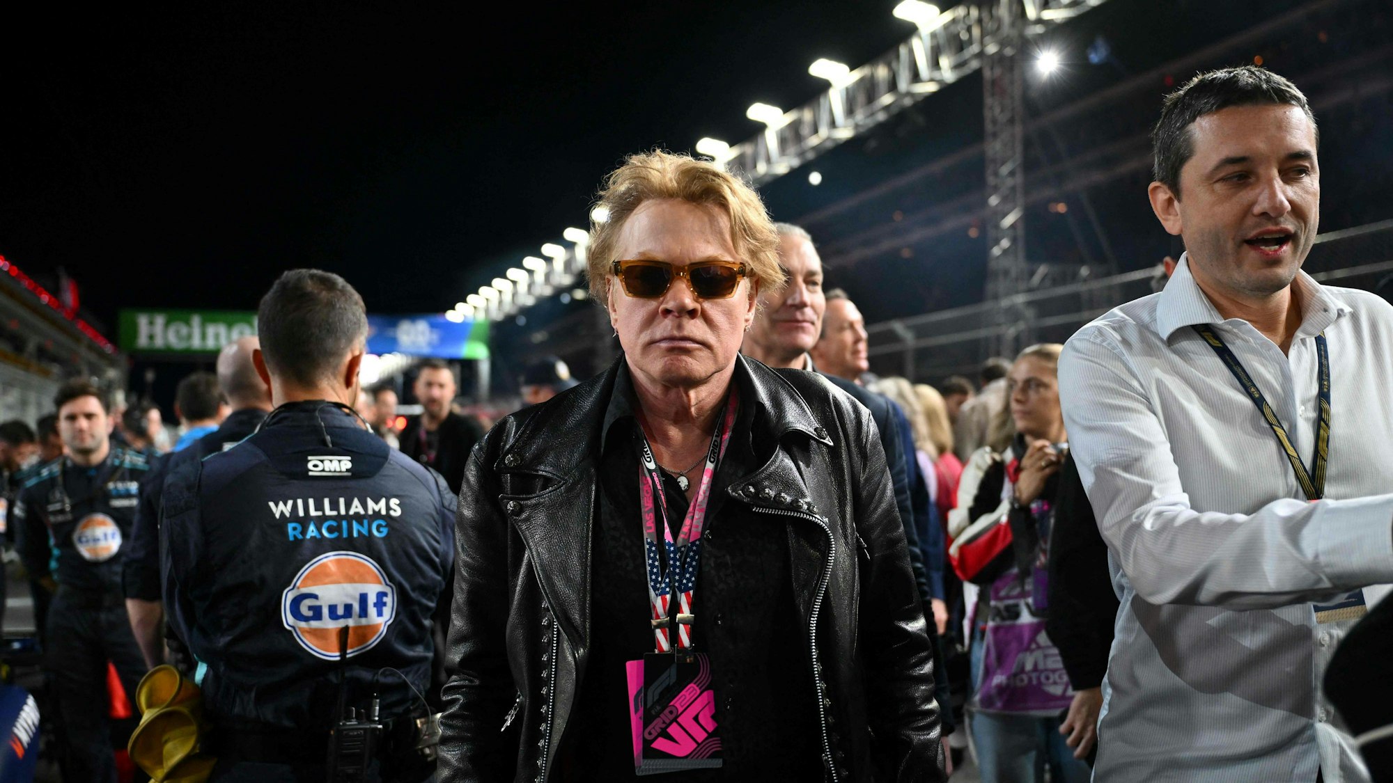 (FILES) Singer Axl Rose tours the grid before the start of the Las Vegas Formula One Grand Prix on November 18, 2023, in Las Vegas, Nevada. Guns N' Roses frontman Axl Rose has been accused of sexually assaulting a woman in 1989, according to a court filing seen by AFP on November 22, 2023.