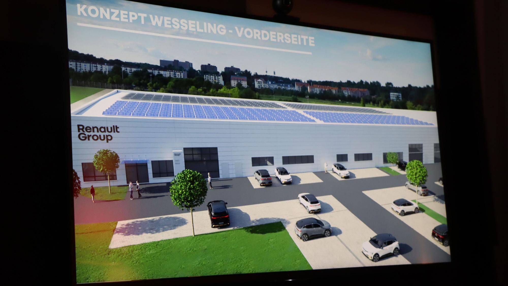 Auf dem Foto ist eine Animation zu sehen, die den Bau des Schulungszentrums zeigt.
