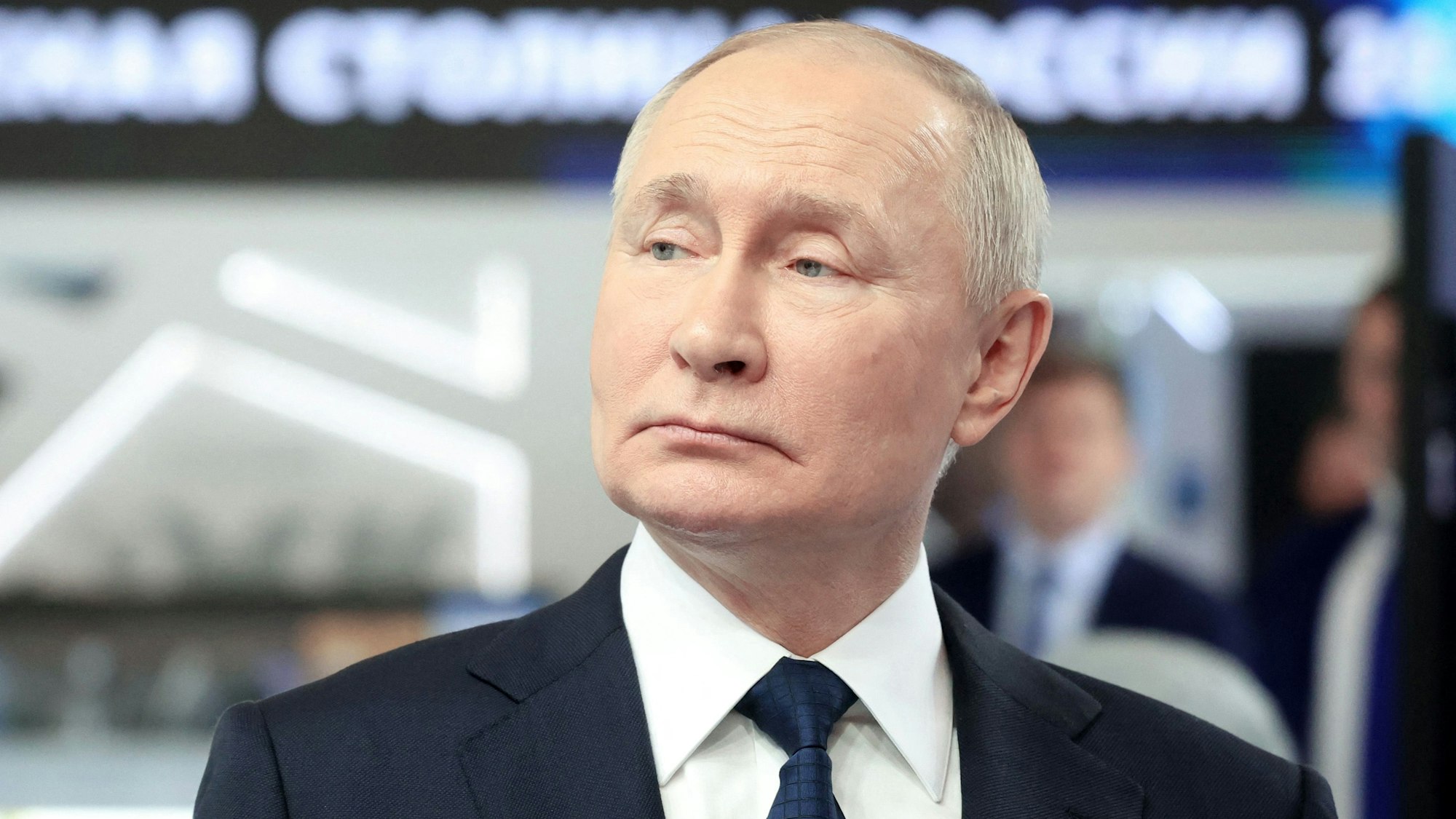 In this pool photograph distributed by Sputnik agency, Russia's President Vladimir Putin visits the exhibition of achievements "Russia" prior to the United Russia party congress in Moscow, on December 17, 2023. (Photo by Sergey FADEICHEV / POOL / AFP)