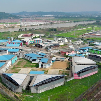 TOPSHOT - Aerial view of the Regional 8 prison in Guayaquil, Ecuador, taken on January 7, 2024, as the National Police and Armed Forces carry out a joint security operation. This operation, which included an intervention at the Guayas 4 Male Social Rehabilitation Centre, is the first such measure taken by President Daniel Noboa. (Photo by Marcos PIN / AFP)