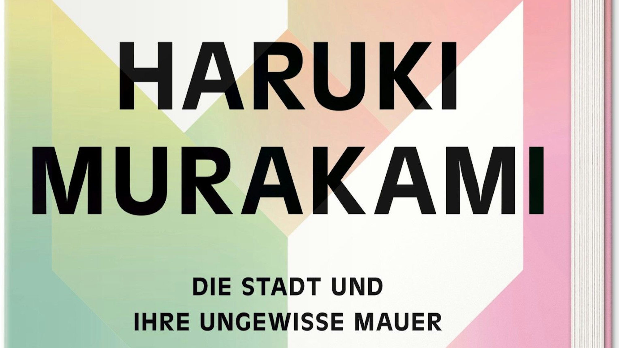 Ein Quader in Pastellfarben bildet den Hintergrund, auf dem der Titel geschrieben steht.