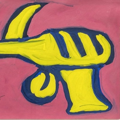 Eine gelbe Pistole vor rotem Hintergrund