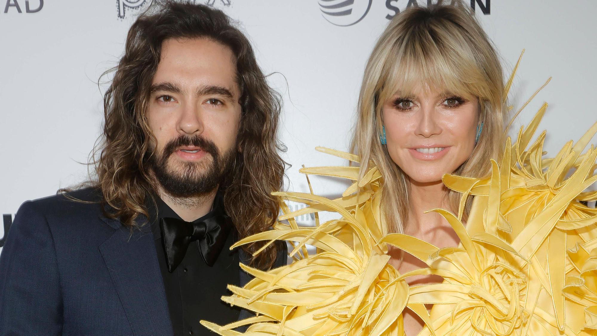 Tom Kaulitz und Heidi Klum bei einer Party.