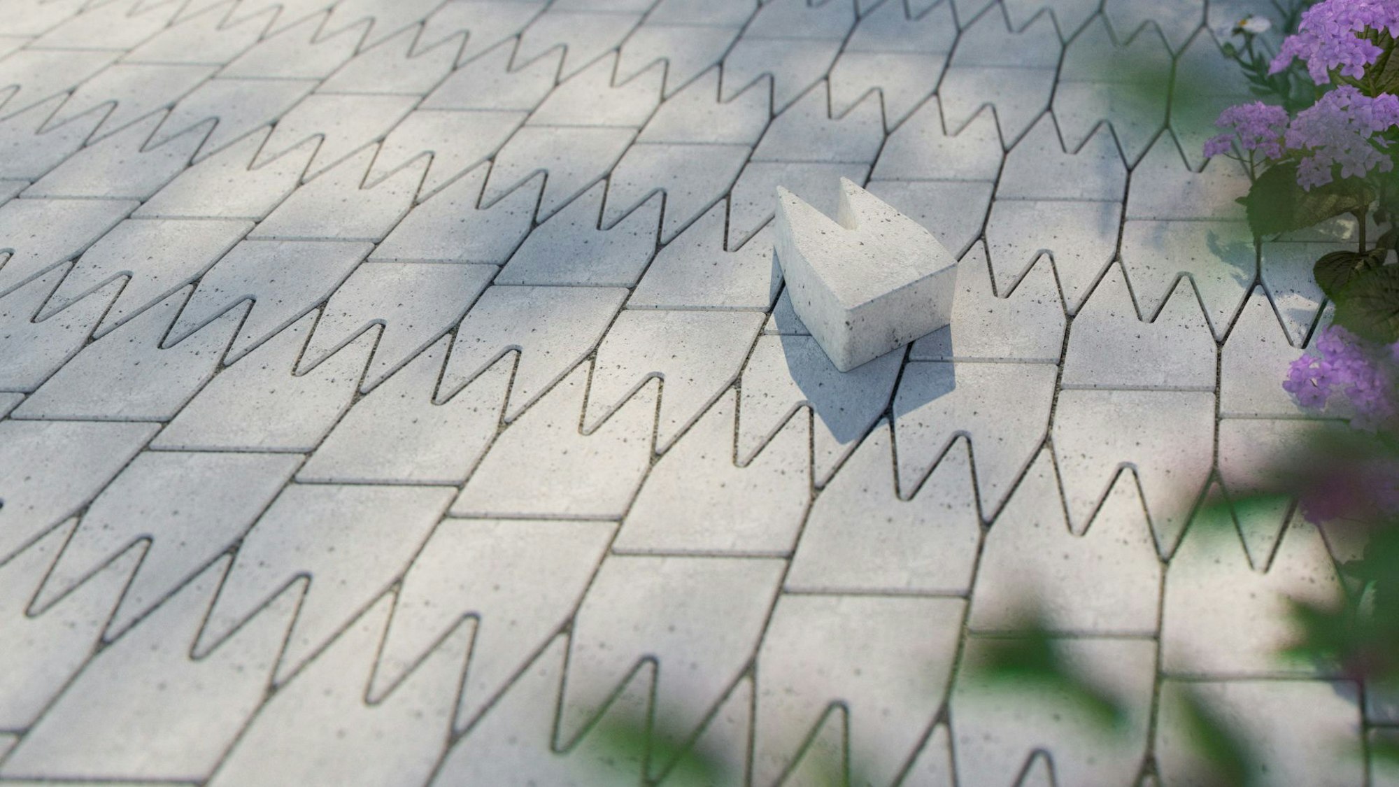 Pflastersteine in Form des Kölner Doms sind auf einem Gehweg verlegt