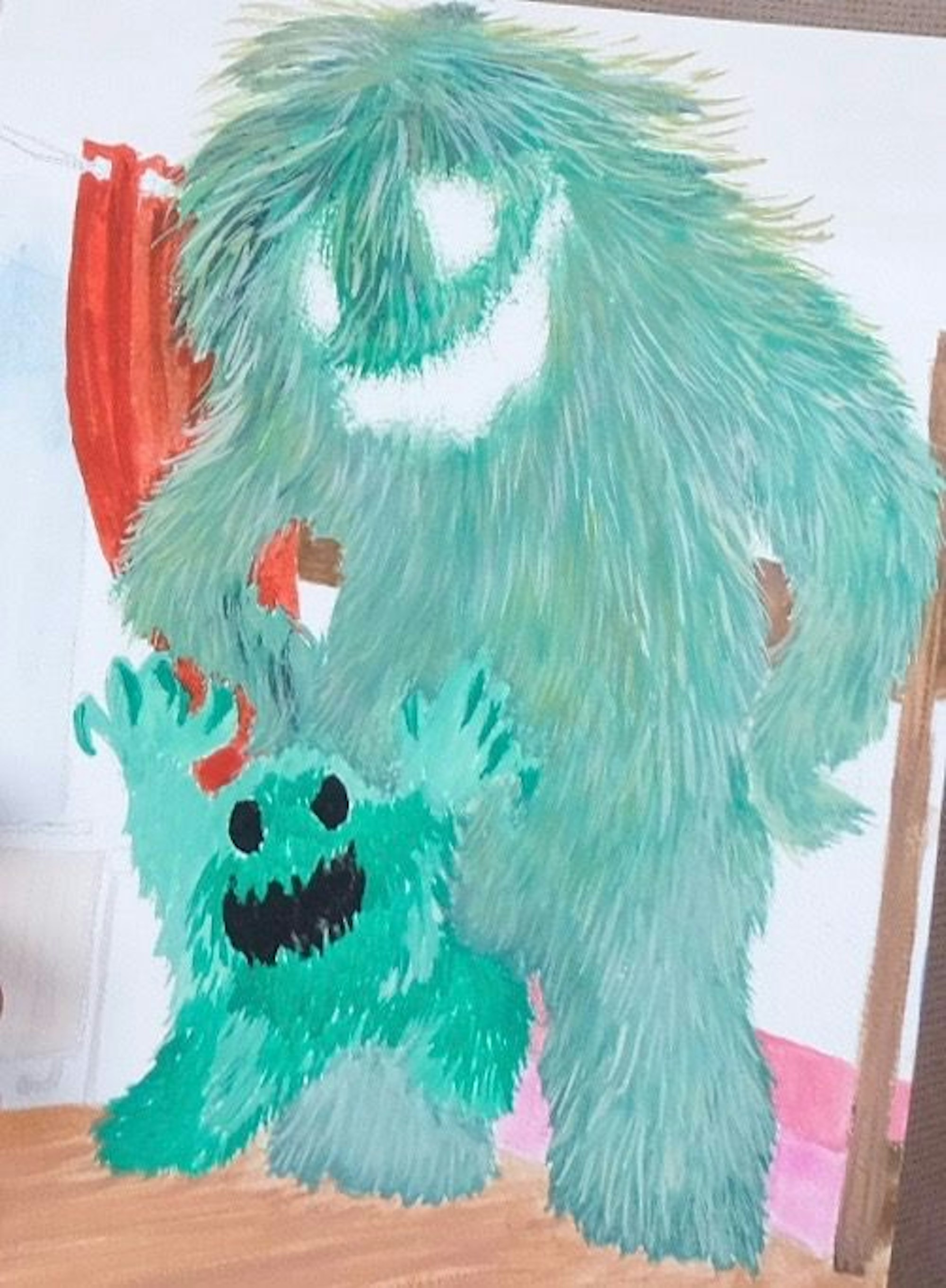 Eine Zeichnung zeigt ein großes und ein kleines grünes Fellmonster.