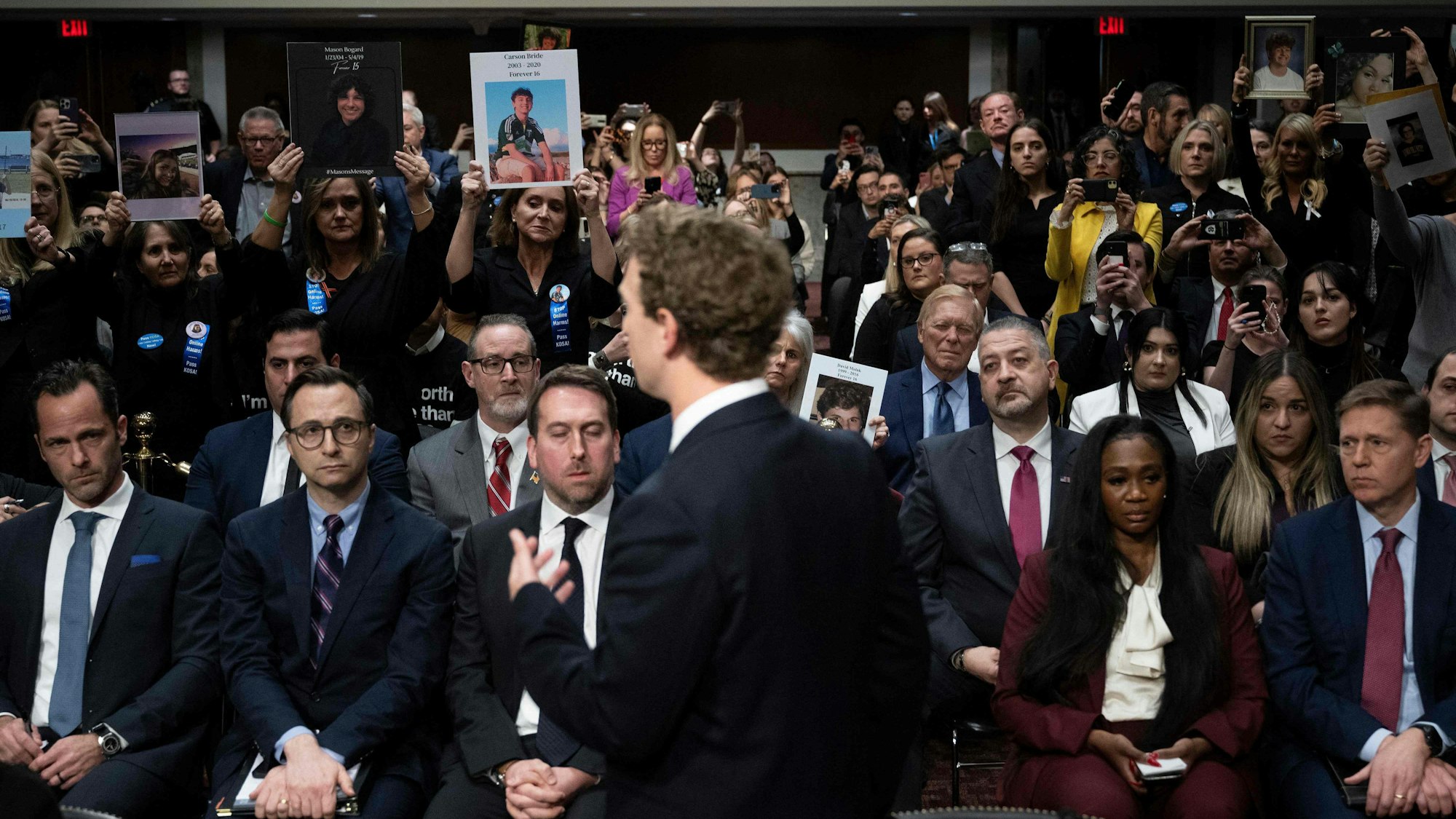 TOPSHOT - Mark Zuckerberg, CEO of Meta, speaks to victims and their family members as he testifies during the US Senate Judiciary Committee hearing "Big Tech and the Online Child Sexual Exploitation Crisis" in Washington, DC, on January 31, 2024. (Photo by Brendan Smialowski / AFP)