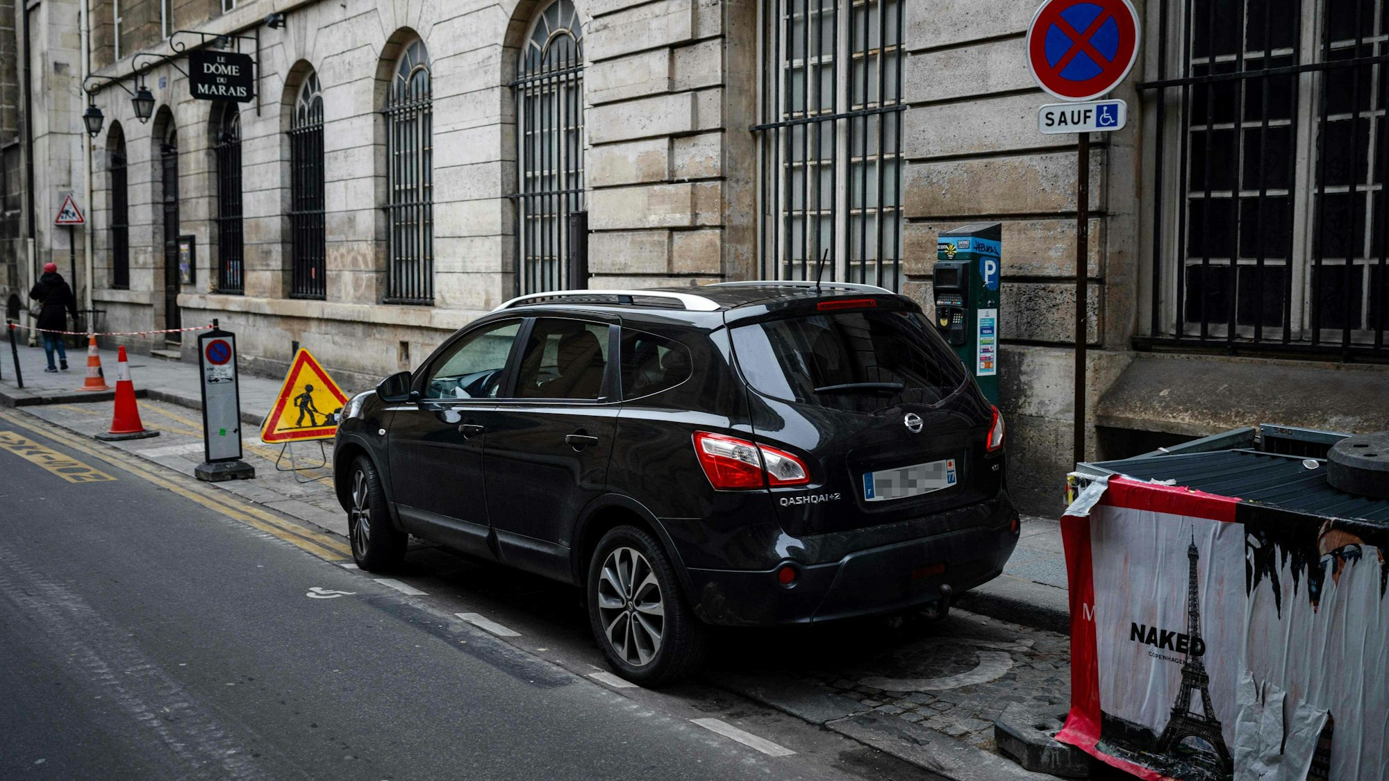 Cars are parked in Paris city center on February 2, 2024 as Paris' city hall is organizing a vote on February 4 on the creation of a special parking fee for heaviest and most polluting cars and SUVs. (Photo by Dimitar DILKOFF / AFP)