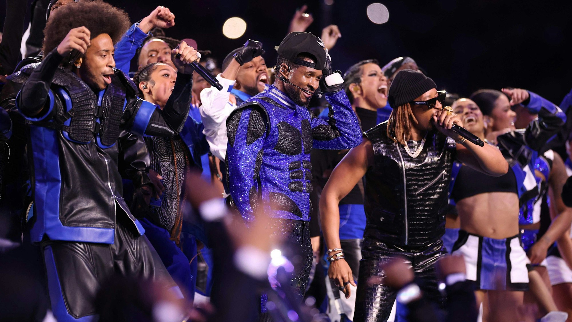 LAS VEGAS, NEVADA - FEBRUARY 11: (L-R) Ludacris, Usher, and Lil Jon perform onstage during the Apple Music Super Bowl LVIII Halftime Show at Allegiant Stadium on February 11, 2024 in Las Vegas, Nevada. Ezra Shaw/Getty Images/AFP (Photo by EZRA SHAW / GETTY IMAGES NORTH AMERICA / Getty Images via AFP)