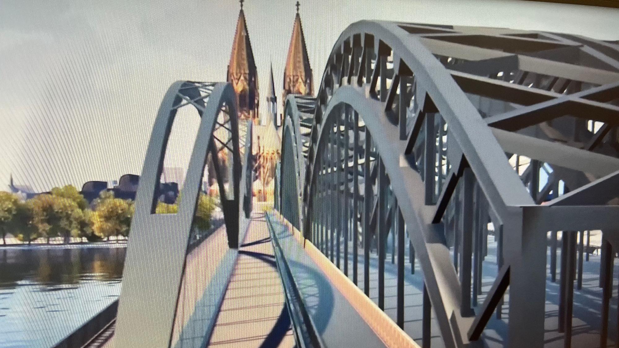 Wo dürfen Radler fahren, wo Fußgänger gehen? Unser Screenshot zeigt die möglichen neuen zwei Wege auf der Hohenzollernbrücke. Noch ist die Aufteilung der Wege unklar.