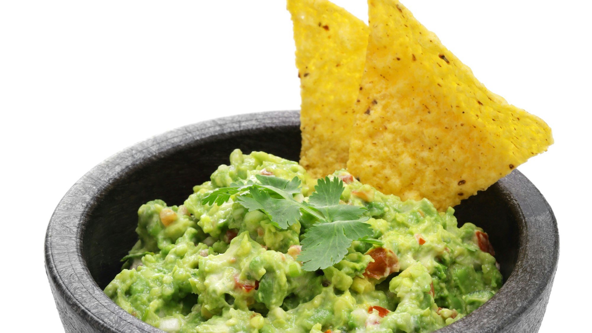 Schüssel mit Guacamole und Tortilla Chips