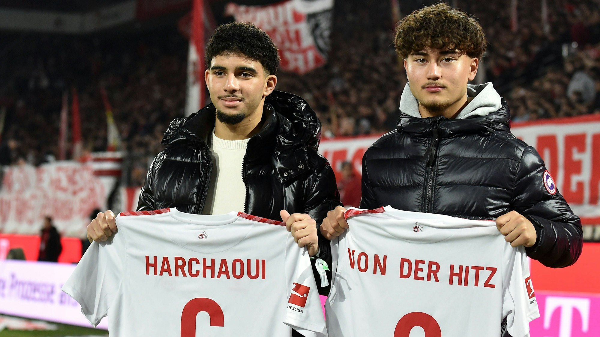 10.12.2023, Cologne, Germany, Rhein-Energie-Stadium, 1. FC Koeln vs 1. FSV Mainz 05 - 1. Bundesliga, U17, U 17 Weltmeister Fayssal Harchaoui und Justin von der Hitz beide 1. FC Koeln schauen waehrend der Ehrung Foto Ralf Treese DFB / DFL REGULATIONS PROHIBIT ANY USE OF PHOTOGRAPHS AS IMAGE SEQUENCES AND/OR QUASI-VIDEO. Cologne Rhein-Energie-Stadium North Rhine-Westphalia Germany *** 10 12 2023, Cologne, Germany, Rhein Energie Stadium, 1 FC Koeln vs 1 FSV Mainz 05 1 Bundesliga, U17 World Champion Fayssal Harchaoui and Justin von der Hitz both 1 FC Koeln look on during the ceremony Photo Ralf Treese DFB DFL REGULATIONS PROHIBIT ANY USE OF PHOTOGRAPHS AS IMAGE SEQUENCES AND OR QUASI VIDEO Cologne Rhein Energie Stadium North Rhine Westphalia Germany / 521_KOEM0520231209_005 / Treese-521