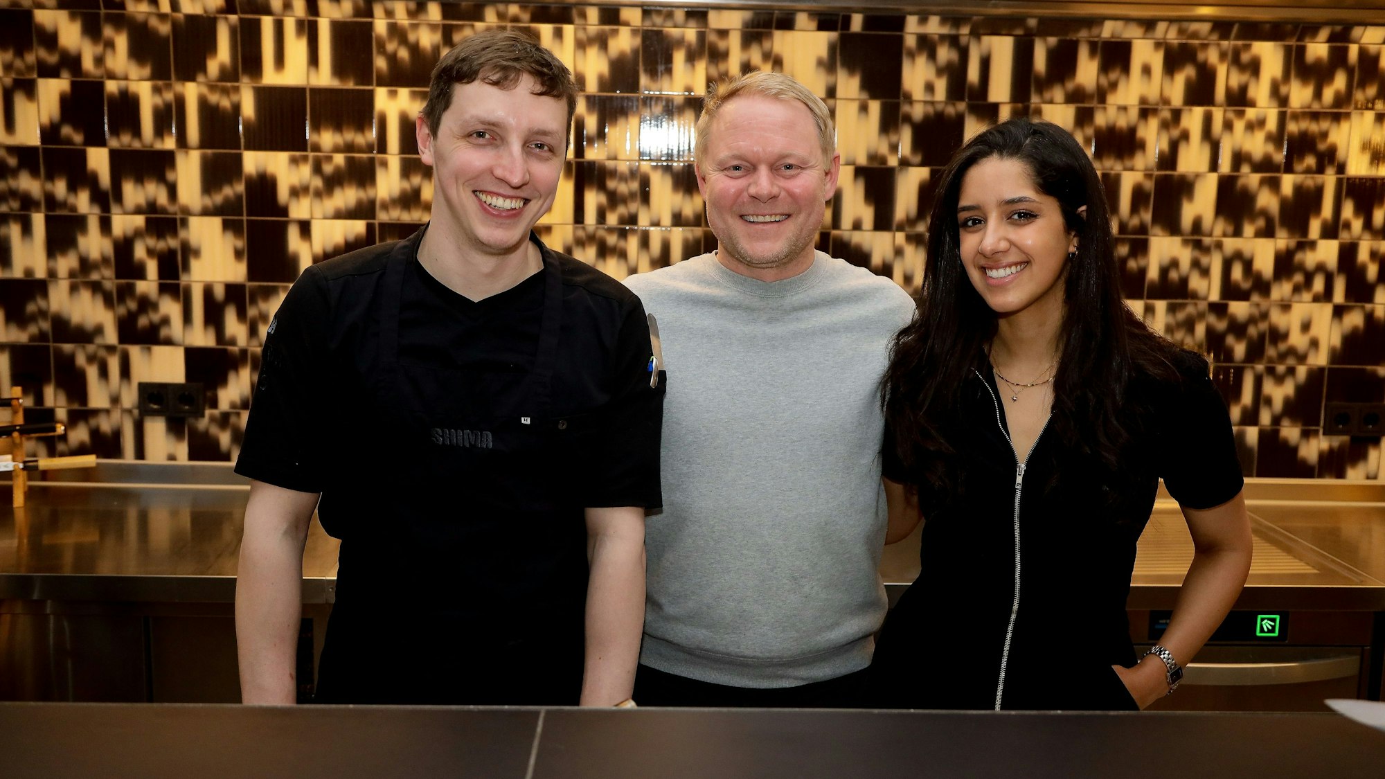 Chefkoch Philippe Zessler, Inhaber Christoph Barciaga und Restaurantleiterin Soukaina Ababou im Porträt.