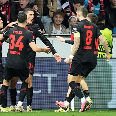 Leverkusen's Patrik Schick, 3rd from left, celebrates after scoring his side's second goal during the Europa League round of sixteen, second leg, soccer match between Bayer Leverkusen and Qarabag FK at the BayArena in Leverkusen, Germany, Thursday, March 14, 2024. (AP Photo/Martin Meissner)