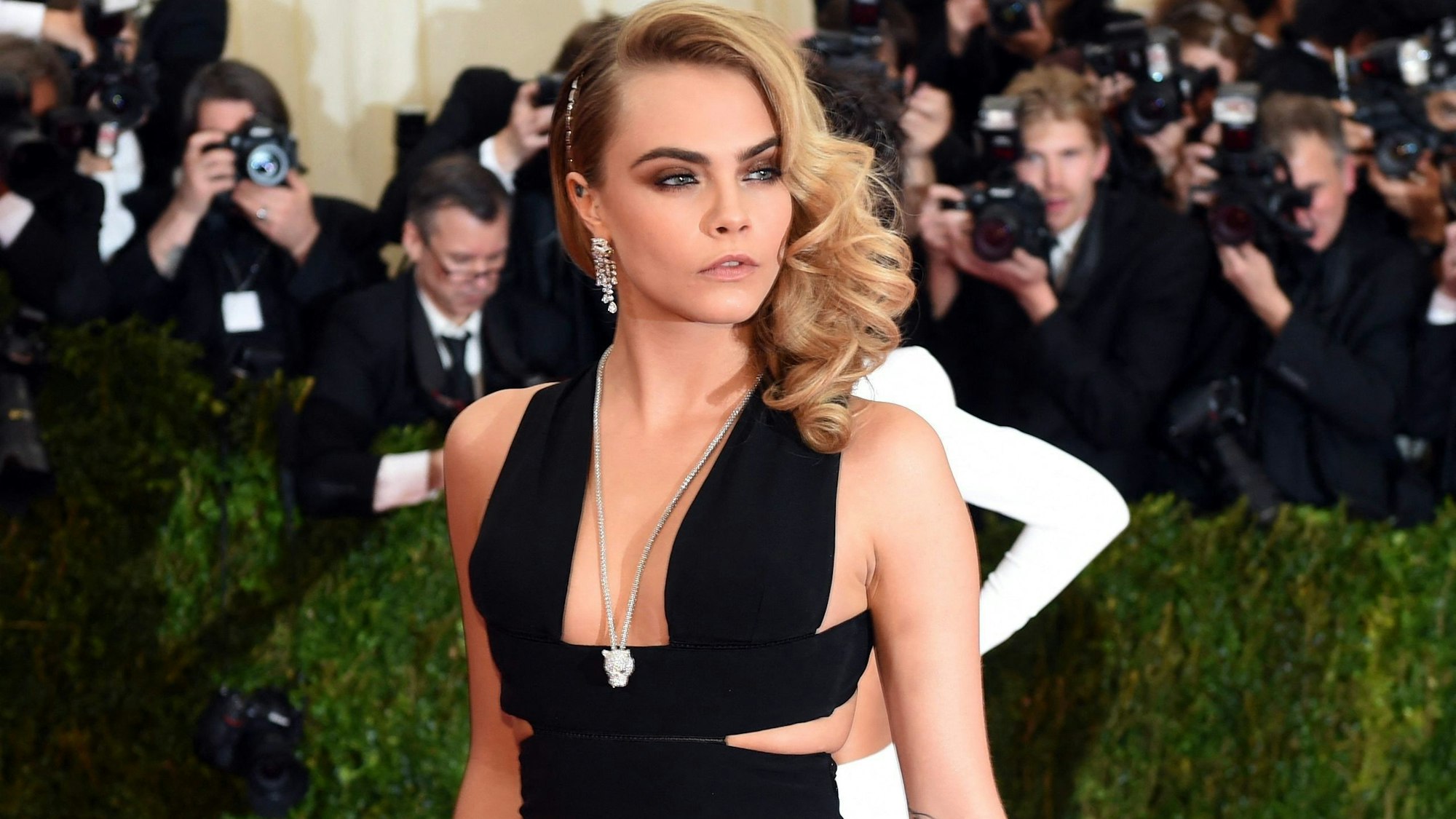 (FILES) Cara Delevigne arrives at the Costume Institute Benefit at The Metropolitan Museum of Art May 5, 2014 in New York. Delevingne's Los Angeles home was gutted in a huge fire on March 15, 2024, in a blaze that left the multimillion-dollar house a smoldering ruin. (Photo by Timothy A. CLARY / AFP)