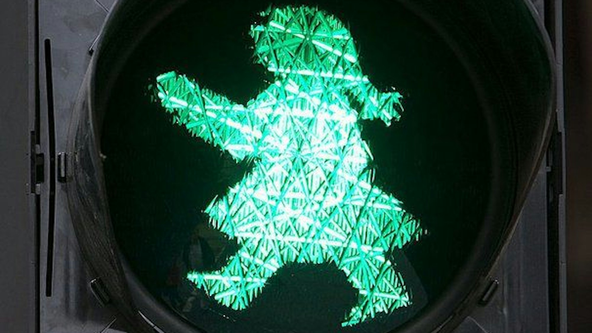 Eine Ampelfrau an einer Lichtsignalanlage in Hamm.