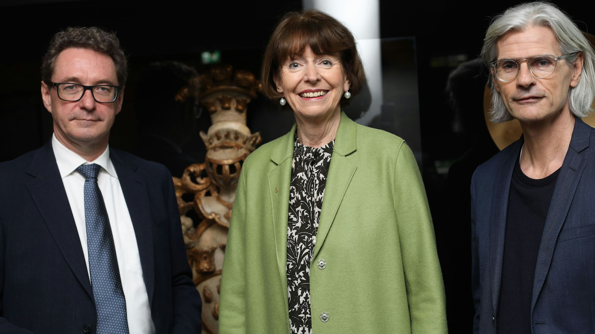 Matthias Hamann, Oberbürgermeisterin Henriette Reker und Kulturdezernenten Stefan Charles (v.l.) bei der Eröffnung des Interims des Stadtmuseums. Das Kölnische Stadtmuseum eröffnet nach langer Umbauphase sein Interim im ehemaligen Modehaus Franz Sauer an der Minoritenstraße 13 in der Innenstadt.