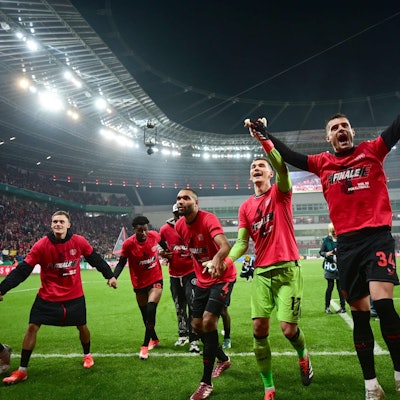 (LtoR) Bayer Leverkusen's Burkinabe defender #12 Edmond Tapsoba, Bayer Leverkusen's German midfielder #10 Florian Wirtz, Bayer Leverkusen's Nigerian midfielder #19 Nathan Tella, Bayer Leverkusen's German defender #04 Jonathan Tah, Leverkusen's Czech goalkeeper #17 Matej Kovar, Bayer Leverkusen's Swiss midfielder #34 Granit Xhaka and Bayer Leverkusen's Czech forward #14 Patrik Schick celebrate their team's 4-0 win after the German Cup (DFB-Pokal) semi-final football match between Bayer 04 Leverkusen and Fortuna Duesseldorf in Leverkusen, western Germany on April 3, 2024. (Photo by INA FASSBENDER / AFP) / DFB REGULATIONS PROHIBIT ANY USE OF PHOTOGRAPHS AS IMAGE SEQUENCES AND QUASI-VIDEO.