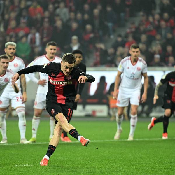 Bayer Leverkusen's German midfielder #10 Florian Wirtz shoots and scores the team's fourth goal during the German Cup (DFB-Pokal) semi-final football match between Bayer 04 Leverkusen and Fortuna Duesseldorf in Leverkusen, western Germany on April 3, 2024. (Photo by INA FASSBENDER / AFP) / DFB REGULATIONS PROHIBIT ANY USE OF PHOTOGRAPHS AS IMAGE SEQUENCES AND QUASI-VIDEO.