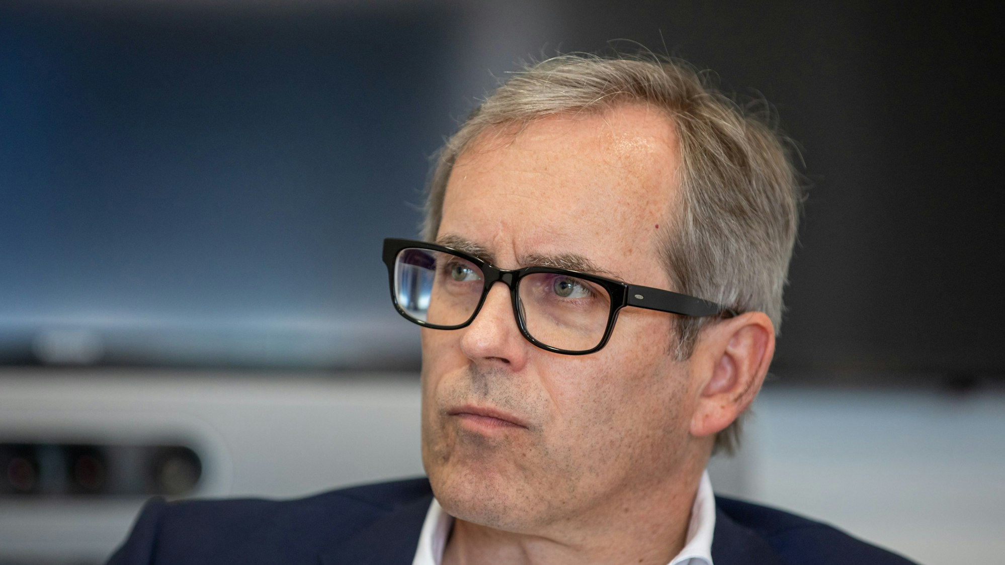 Tengelmann-Chef Christian Haub ist im Porträt zu sehen.