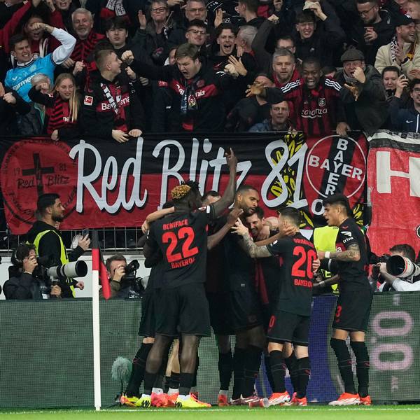 Leverkusen's Jonas Hofmann, centre, celebrates with teammates after scoring the opening goal during the Europa League quarterfinals first leg soccer match between Bayer 04 Leverkusen and West Ham United at the BayArena in Leverkusen, Germany, Thursday, April 11, 2024. (AP Photo/Martin Meissner)