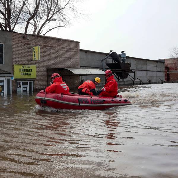 Russian Emergency Ministry employees ride a boat as they patrol the flooded street in Orenburg, Russia, Friday, April 12, 2024. Floods have sparked evacuations of thousands in the Orenburg region, located some 1,200 kilometers (745 miles), southeast of the capital of Moscow after a dam on the river burst last week under the pressure of surging waters. Local authorities have declared a state of emergency in the region. (AP Photo)