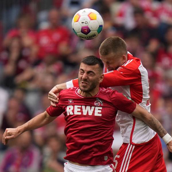 Cologne's Sargis Adamyan, left, jumps for a header with Bayern's Eric Dier during the German Bundesliga soccer match between Bayern Munich and Cologne at the Allianz Arena in Munich, Germany, Saturday, April 13, 2024. (AP Photo/Matthias Schrader)