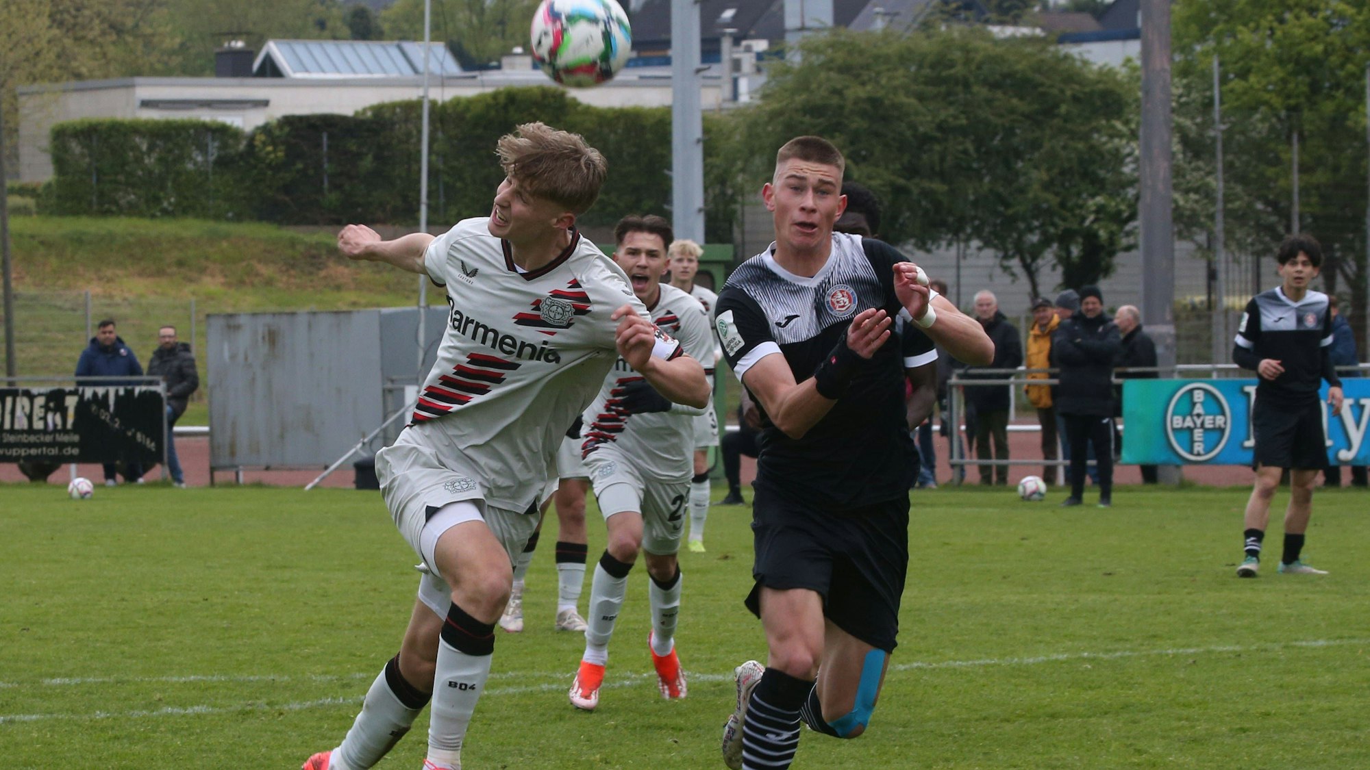 Bundesliga A - Junioren Staffel West, Saison 2023 -2024, 23. Spieltag, 21.04.2024, Wuppertaler SV - Bayer 04 Leverkusen.-- Ivan Yermachkov Wuppertaler SV / rechts und Filip Milojevic Bayer 04 Leverkusen *** Bundesliga A Junioren Staffel West, Season 2023 2024, Matchday 23, 21 04 2024, Wuppertaler SV Bayer 04 Leverkusen Ivan Yermachkov Wuppertaler SV right and Filip Milojevic Bayer 04 Leverkusen