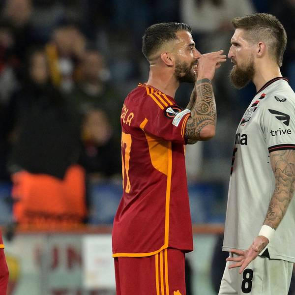 Roma's Leonardo Spinazzola, left, and Leverkusen's Robert Andrich exchange words during the Europa League semifinal first leg soccer match between Roma and Bayer Leverkusen at Rome's Olympic Stadium in Rome, Italy, Thursday, May 2, 2024. (Alfredo Falcone/LaPresse via AP)